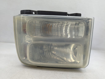 compare product Ford F-250 Driver Left Oem Head Light Headlight Lamp