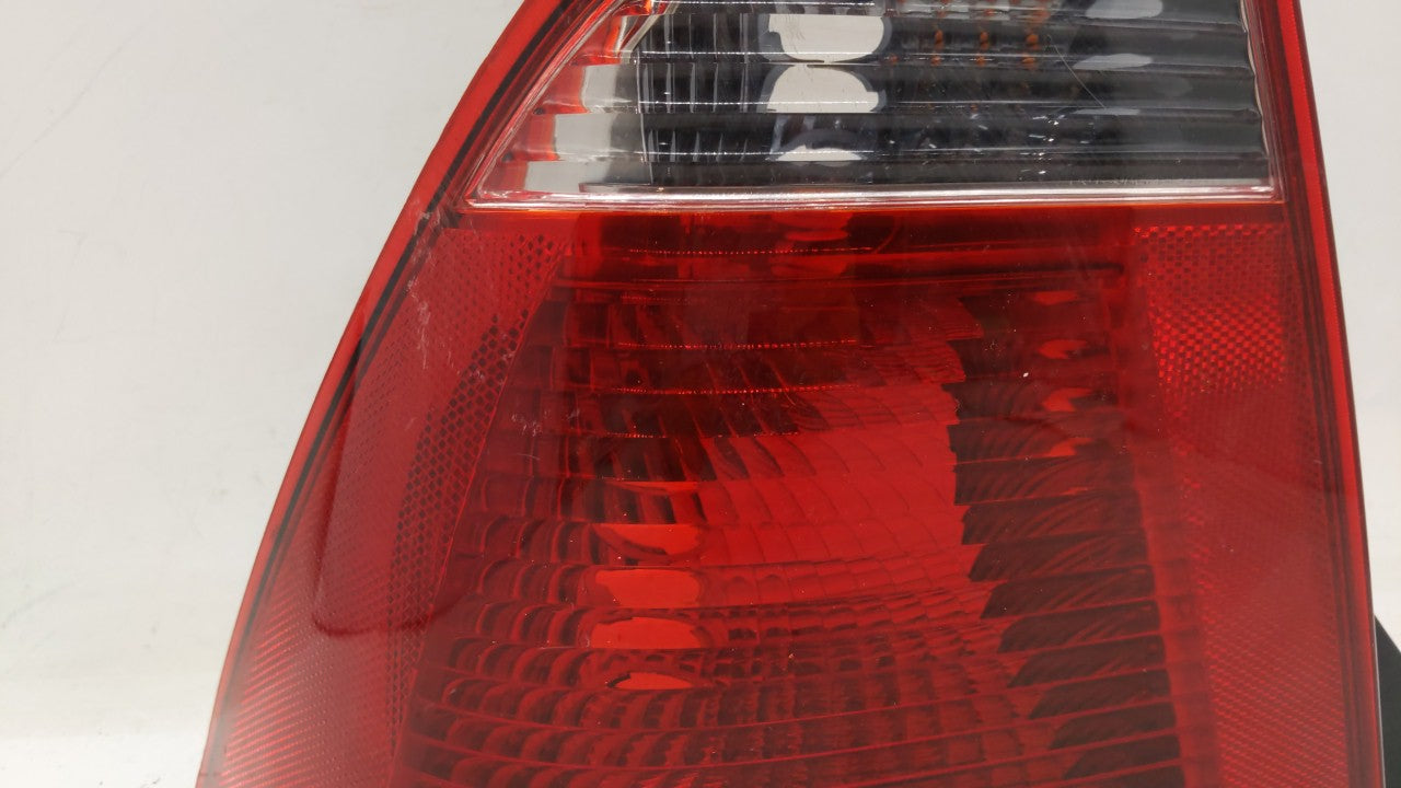 2005-2007 Ford Focus Tail Light Assembly Driver Left OEM P/N:5S43-13B505-A Fits Fits 2005 2006 2007 OEM Used Auto Parts - Oe