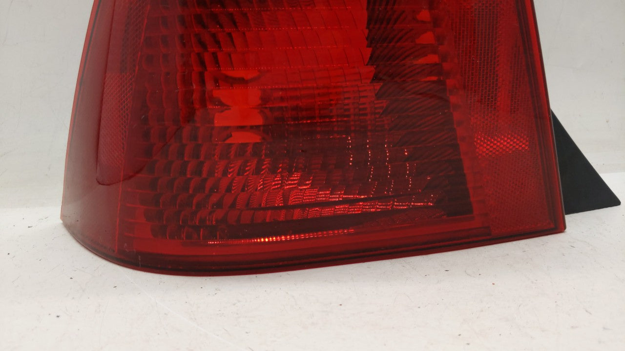 2005-2007 Ford Focus Tail Light Assembly Driver Left OEM P/N:5S43-13B505-A Fits Fits 2005 2006 2007 OEM Used Auto Parts - Oe