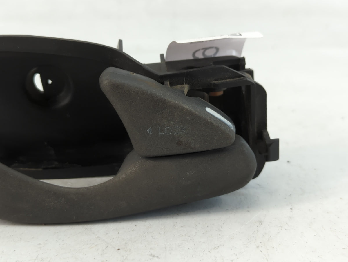 2007 Ford Focus Drivers Side Inside Front Door Handle Oem Black - Oemusedautoparts1.com
