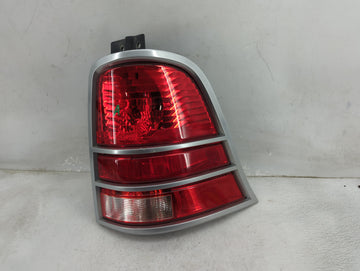 2004-2007 Ford Freestar Tail Light Assembly Passenger Right OEM P/N:5F23-13B504-B 935991-22-SAE Fits Fits 2004 2005 2006 200