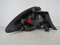 2004-2007 Ford Taurus Driver Left Side Deck Lid Mounted Tail Light 992989 - Oemusedautoparts1.com