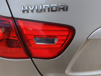 compare product 2007-2010 Hyundai Elantra Driver Left Side Deck Lid Mounted Tail Light 1216843