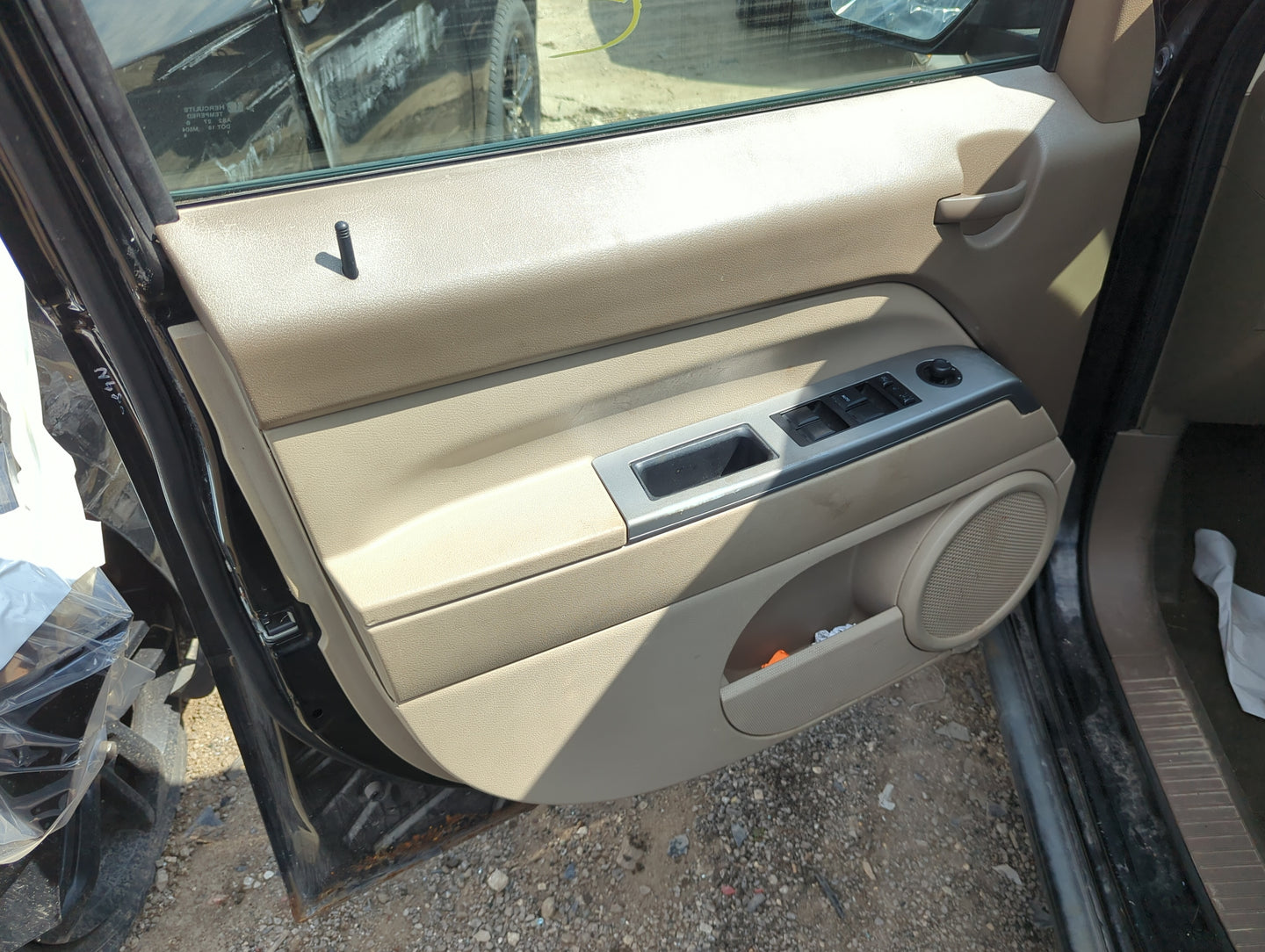 2007 Jeep Patriot Front Left Driver Interior Door Panel Trim - Oemusedautoparts1.com