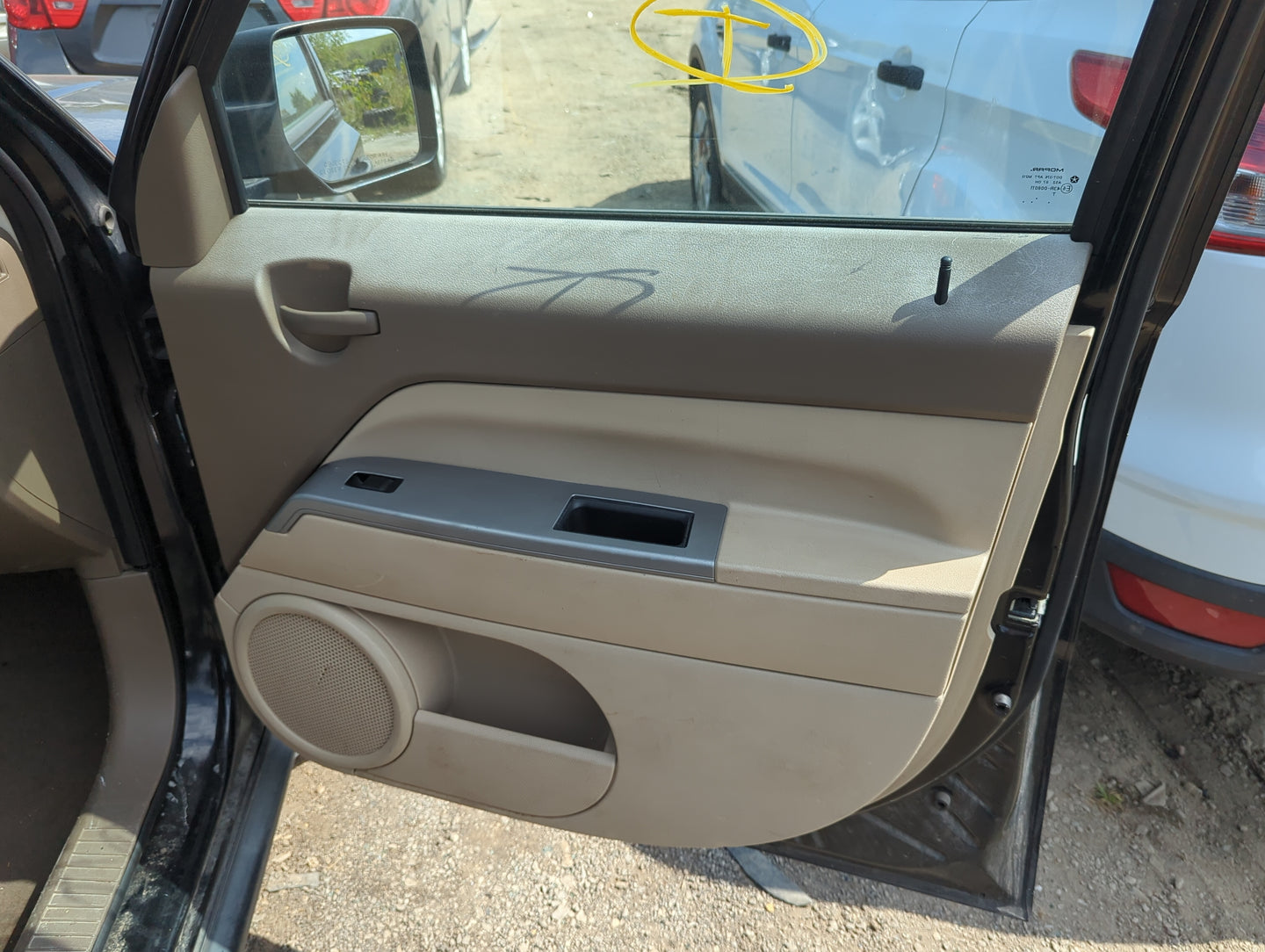 2007 Jeep Patriot Front Right Passenger Interior Door Panel Trim - Oemusedautoparts1.com