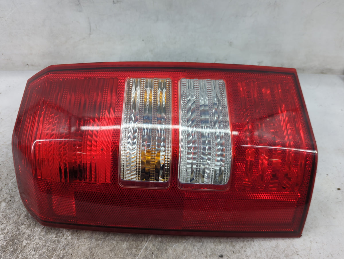 2007 Jeep Patriot Tail Light Assembly Driver Left OEM P/N:P27W17W 3157 Fits OEM Used Auto Parts - Oemusedautoparts1.com