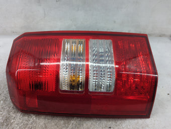 compare product 2007 Jeep Patriot Tail Light Assembly Driver Left OEM P/N:P27W17W 3157 Fits OEM Used Auto Parts