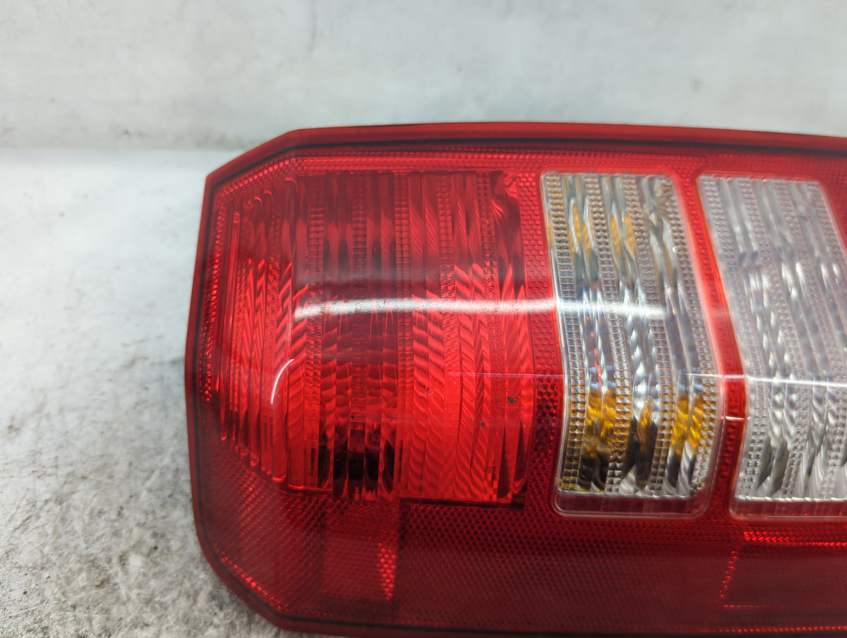 2007 Jeep Patriot Tail Light Assembly Driver Left OEM P/N:P27W17W 3157 Fits OEM Used Auto Parts - Oemusedautoparts1.com