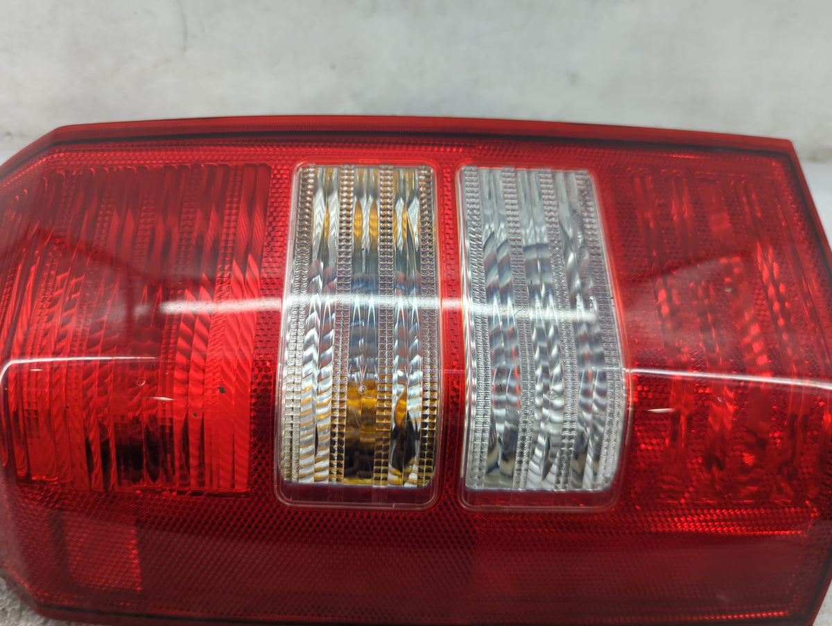 2007 Jeep Patriot Tail Light Assembly Driver Left OEM P/N:P27W17W 3157 Fits OEM Used Auto Parts - Oemusedautoparts1.com