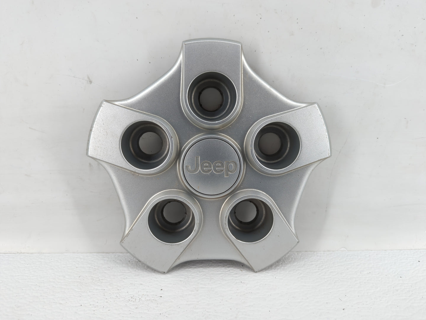 2007 Jeep Patriot Rim Wheel Center Cap Silver - Oemusedautoparts1.com