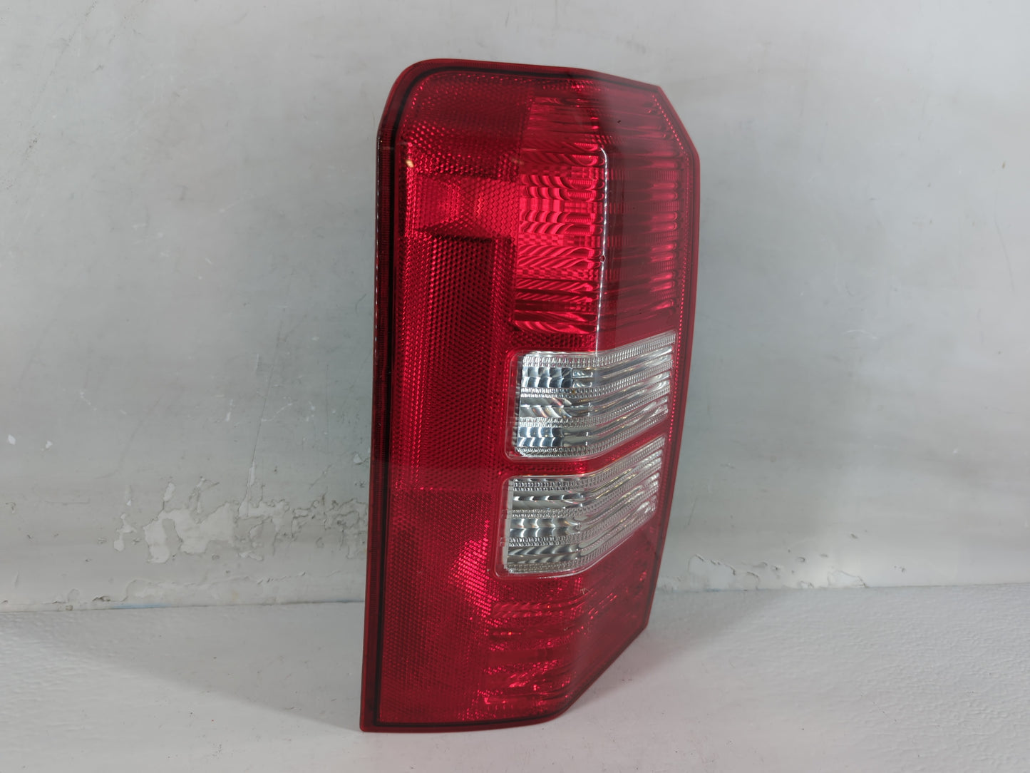 2007 Jeep Patriot Tail Light Assembly Driver Left OEM P/N:224133 Fits OEM Used Auto Parts - Oemusedautoparts1.com