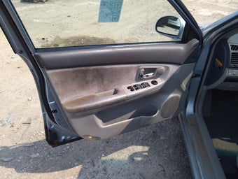 compare product 2007 Kia Spectra Front Left Driver Interior Door Panel Trim