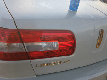compare product 2007 Lincoln Mkz Driver Left Side Tail Light Taillight Deck Lid Mounted