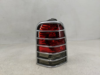 compare product 2005-2007 Mercury Mariner Tail Light Assembly Driver Left OEM P/N:5E64-13B505-A Fits Fits 2005 2006 2007 OEM Used Auto Parts