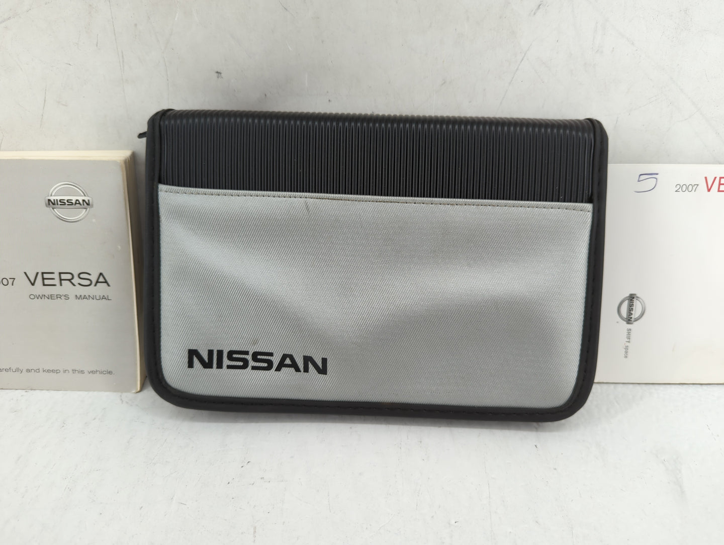 2007 Nissan Versa Owners Manual Book Guide P/N:OM7E-0C11U0 OEM Used Auto Parts - Oemusedautoparts1.com