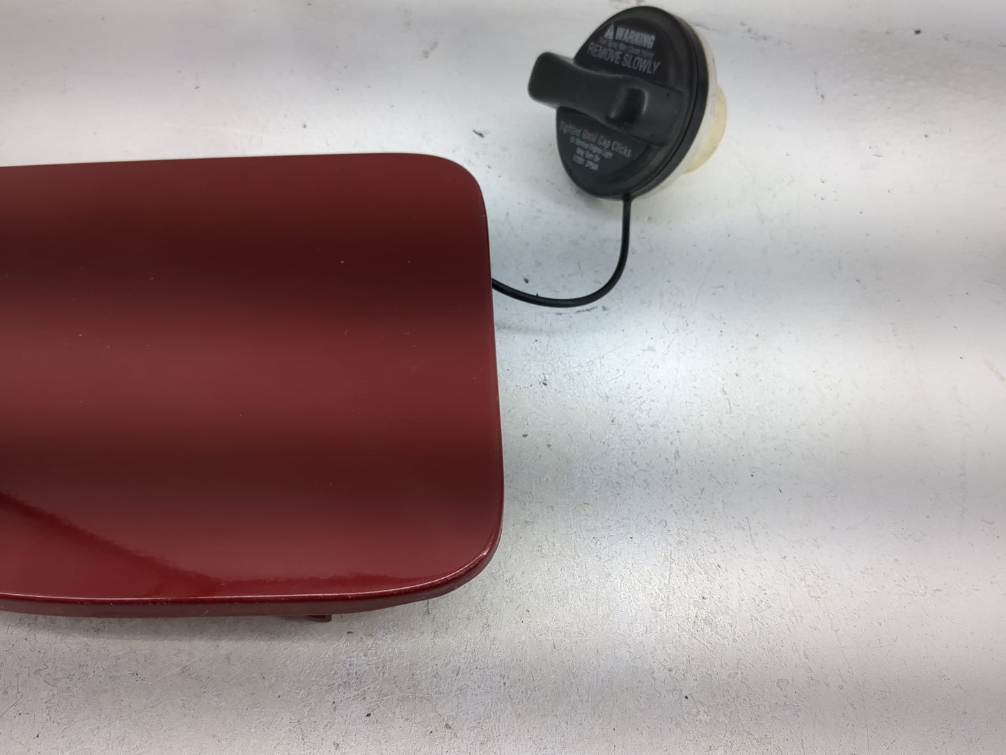 2007 Nissan Xterra Fuel Tank Door Lid Gas Tank Dark Red - Oemusedautoparts1.com