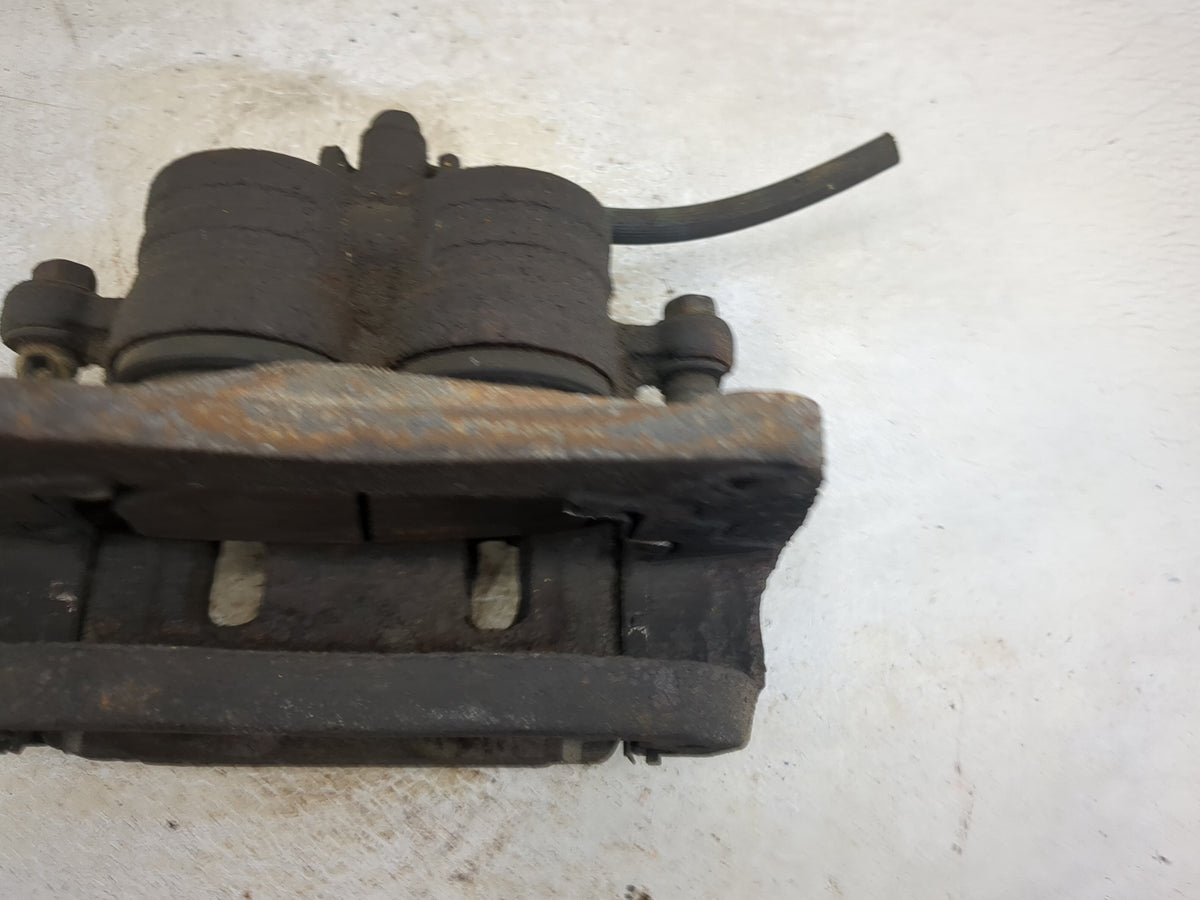 2002-2009 Subaru Impreza Front Driver Left Brake Caliper 1511048 - Oemusedautoparts1.com
