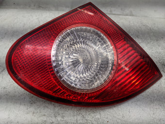 compare product 2003-2008 Toyota Corolla Driver Left Side Deck Lid Mounted Tail Light 1479863