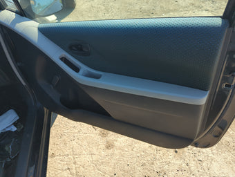 compare product 2007 Toyota Yaris Front Right Passenger Interior Door Panel Trim
