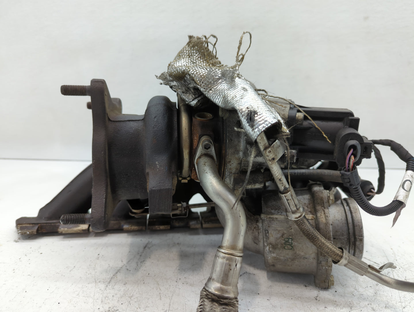 2008-2008 Volkswagen Eos Turbocharger Exhaust Manifold With Turbo Charger - Oemusedautoparts1.com
