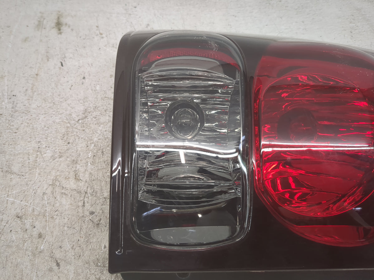 2002-2009 Chevrolet Trailblazer Tail Light Assembly Driver Left OEM Fits Fits 2002 2003 2004 2005 2006 2007 2008 2009 OEM Us
