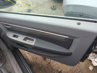 2008 Chrysler Sebring Front Right Passenger Interior Door Panel Trim - Oemusedautoparts1.com