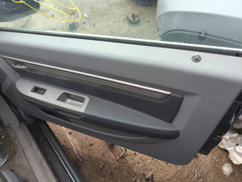 compare product 2008 Chrysler Sebring Front Right Passenger Interior Door Panel Trim