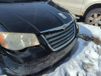 compare product 2008-2010 Chrysler Town & Country Front Grille Bumper Not Included 1366575