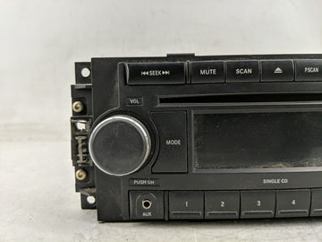 2007-2009 Dodge Caliber Radio AM FM Cd Player Receiver Replacement P/N:P05064171AM Fits Fits 2004 2005 2006 2007 2008 2009 2010 OEM Used Auto Parts