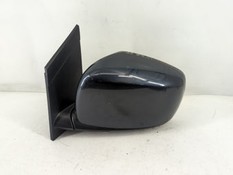 compare product 2008 Dodge Caravan Driver Side View Mirror - Left Door Mirror OEM Used
