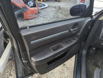 compare product 2008 Dodge Charger Front Left Driver Interior Door Panel Trim 1289487