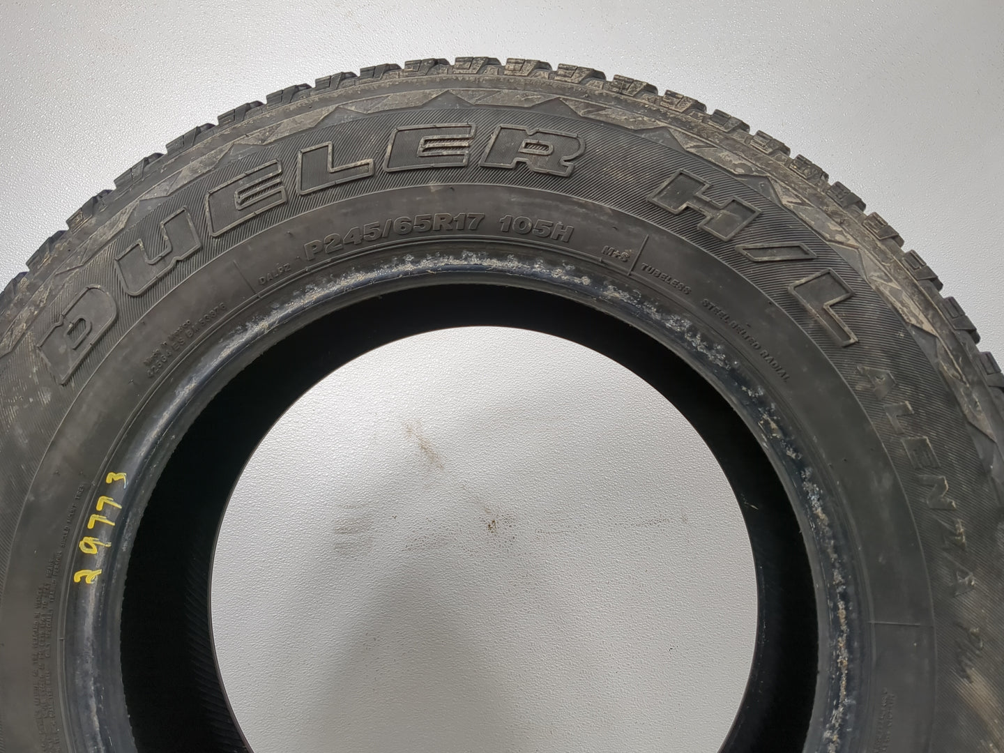 Used Tire P245/65R17 BRIDGESTONE DUELER H/L ALENZA PLUS 105H - Tread Depth 8/32 - Oemusedautoparts1.com