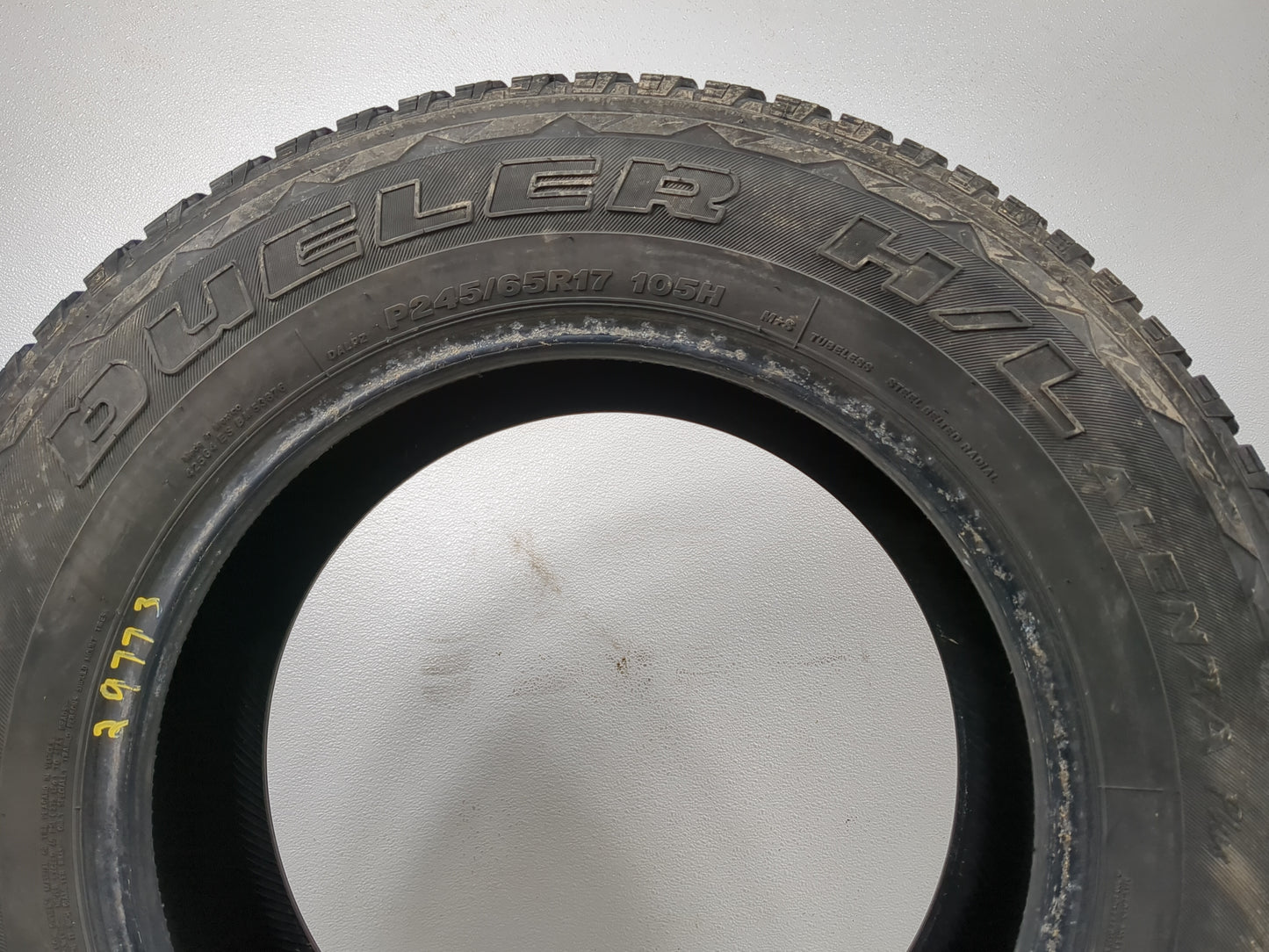 Used Tire P245/65R17 BRIDGESTONE DUELER H/L ALENZA PLUS 105H - Tread Depth 8/32 - Oemusedautoparts1.com