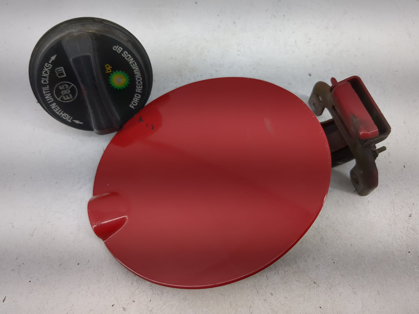 2008 Ford Focus Fuel Tank Door Lid Gas Tank Red - Oemusedautoparts1.com