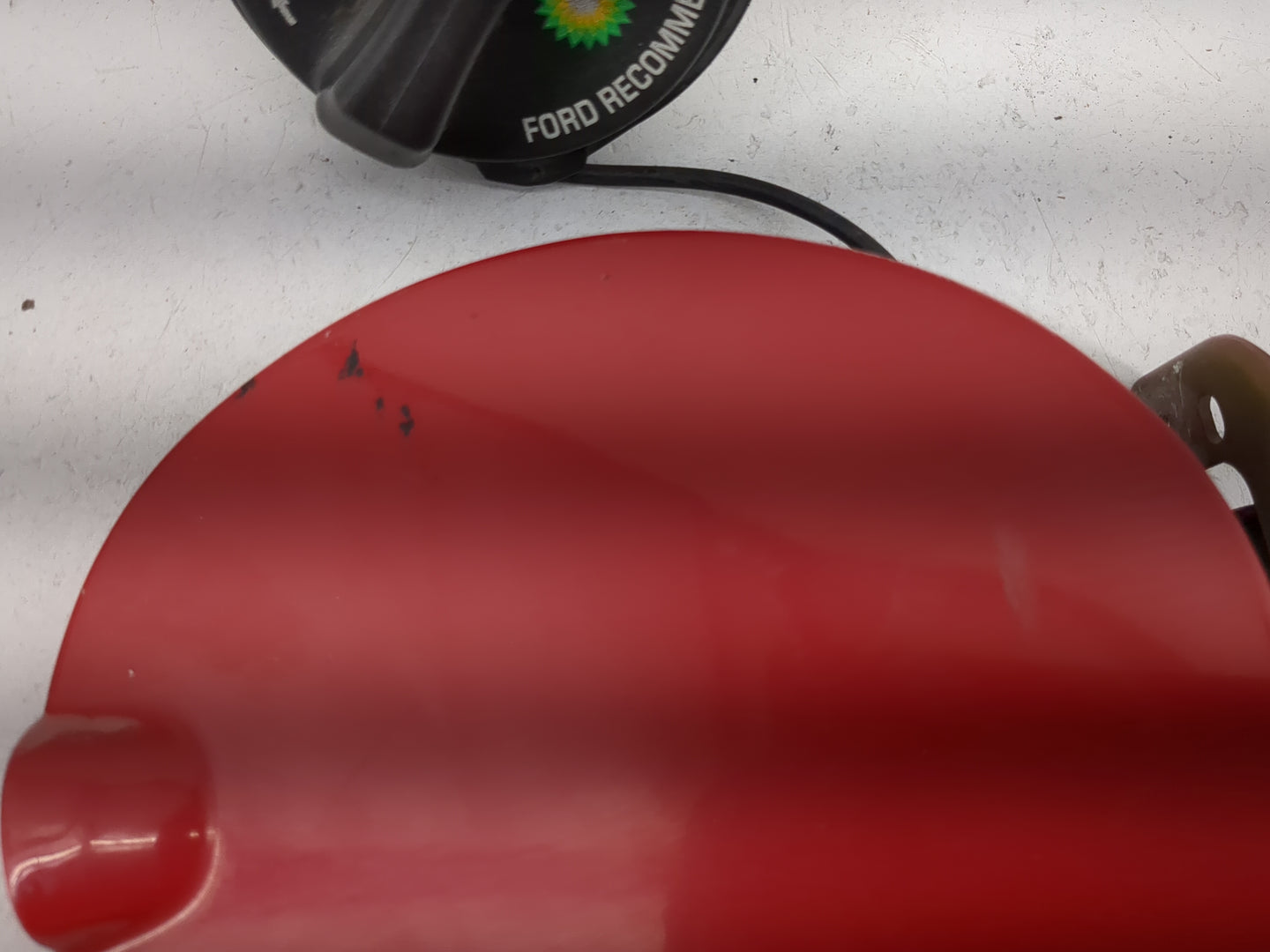 2008 Ford Focus Fuel Tank Door Lid Gas Tank Red - Oemusedautoparts1.com