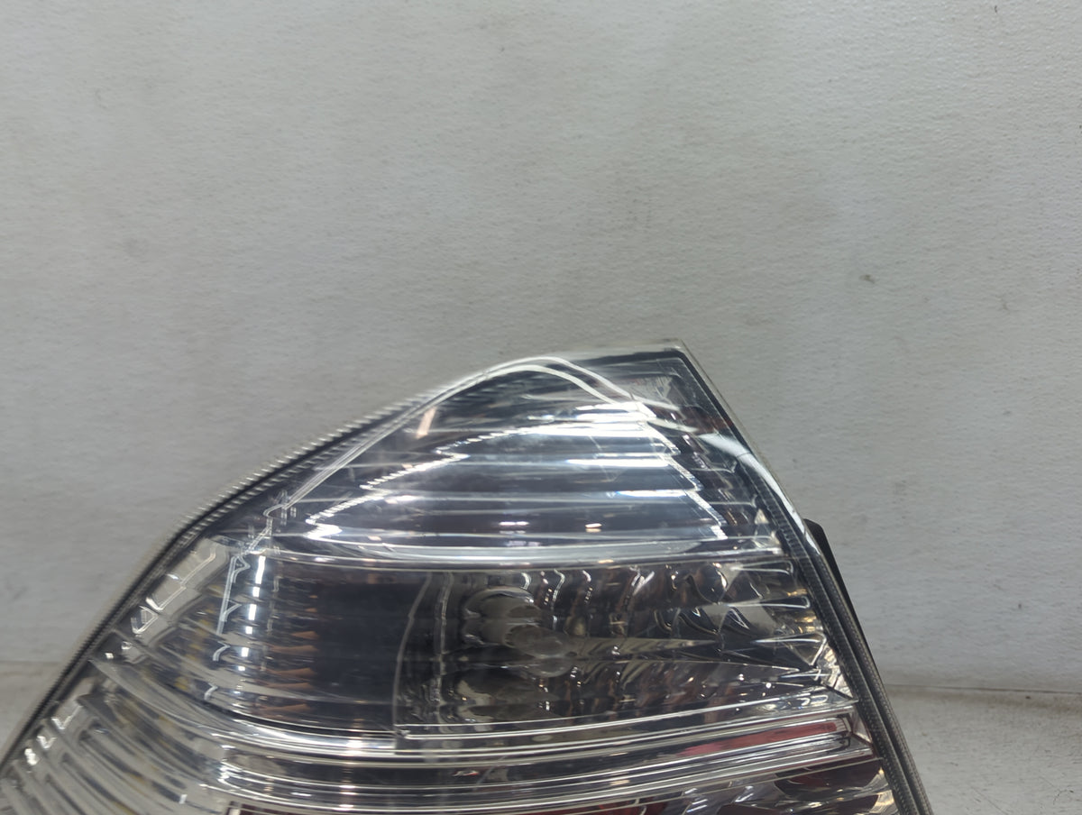 2008 Ford Taurus Tail Light Assembly Driver Left OEM P/N:F80B 13411-BA, US1020959 Fits OEM Used Auto Parts - Oemusedautopart