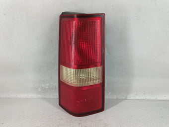 compare product 2003-2014 Gmc Savana 1500 Tail Light Assembly Driver Left OEM P/N:25823028 Fits OEM Used Auto Parts