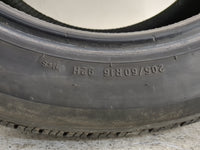 Used Tire 205/60R16 UNIROYAL TIGER PAW TOURING A/S 92H - Tread Depth 12/32 - Oemusedautoparts1.com