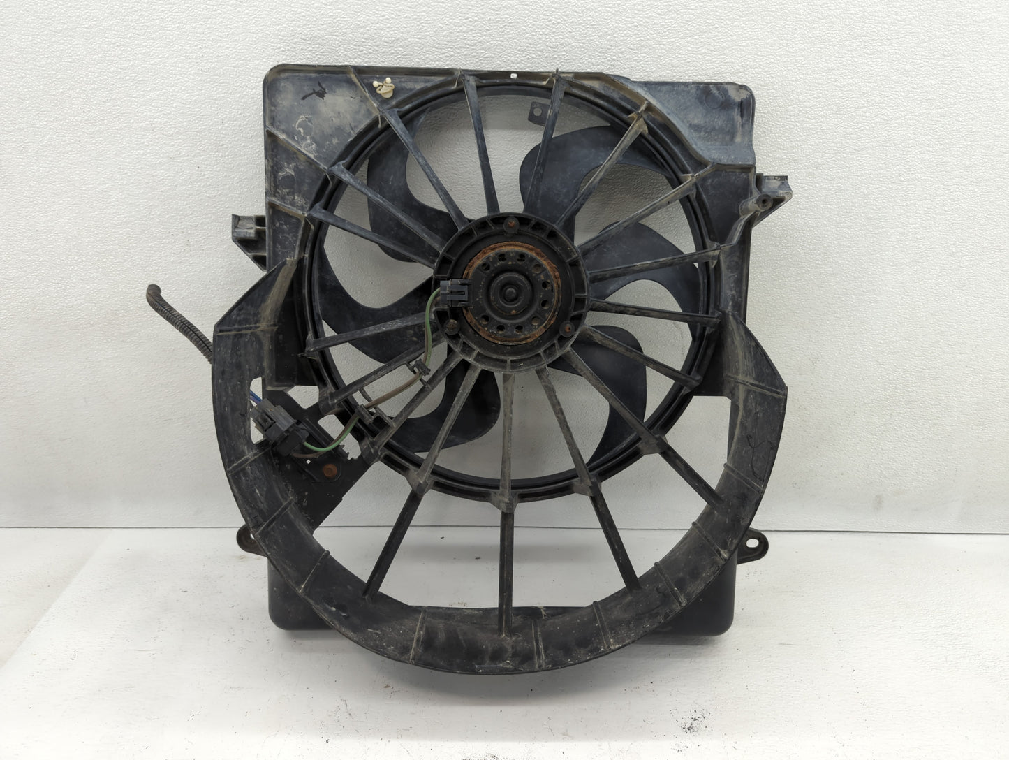 2008-2012 Jeep Liberty Left Radiator Fan Motor Assembly - Oemusedautoparts1.com