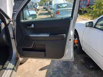 compare product 2008 Mercury Mariner Front Right Passenger Interior Door Panel Trim 1178162