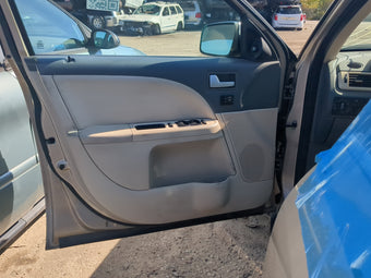 compare product 2008 Mercury Sable Front Left Driver Interior Door Panel Trim