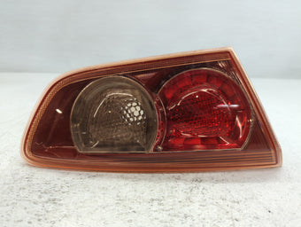 compare product 2008 Mitsubishi Lancer Tail Light Assembly Driver Left OEM Fits OEM Used Auto Parts