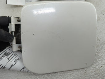 compare product 2008 Nissan Maxima Fuel Tank Door Lid Gas Tank White