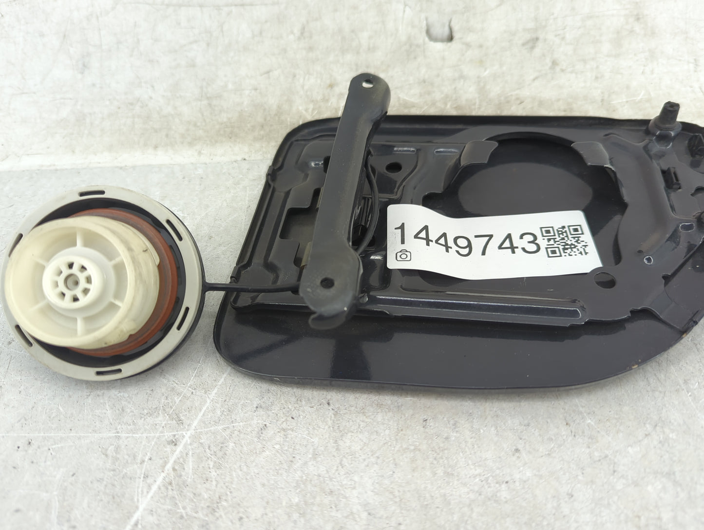 2008 Nissan Xterra Fuel Tank Door Lid Gas Tank Black - Oemusedautoparts1.com