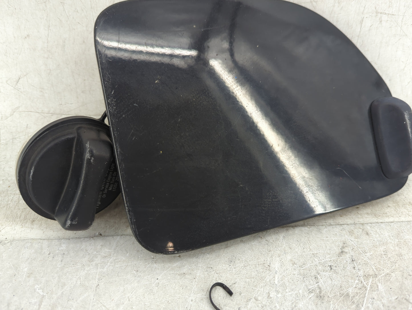 2008 Nissan Xterra Fuel Tank Door Lid Gas Tank Black - Oemusedautoparts1.com