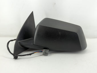 compare product 2008 Saturn Outlook Driver Side View Mirror - Left Door Mirror OEM Used