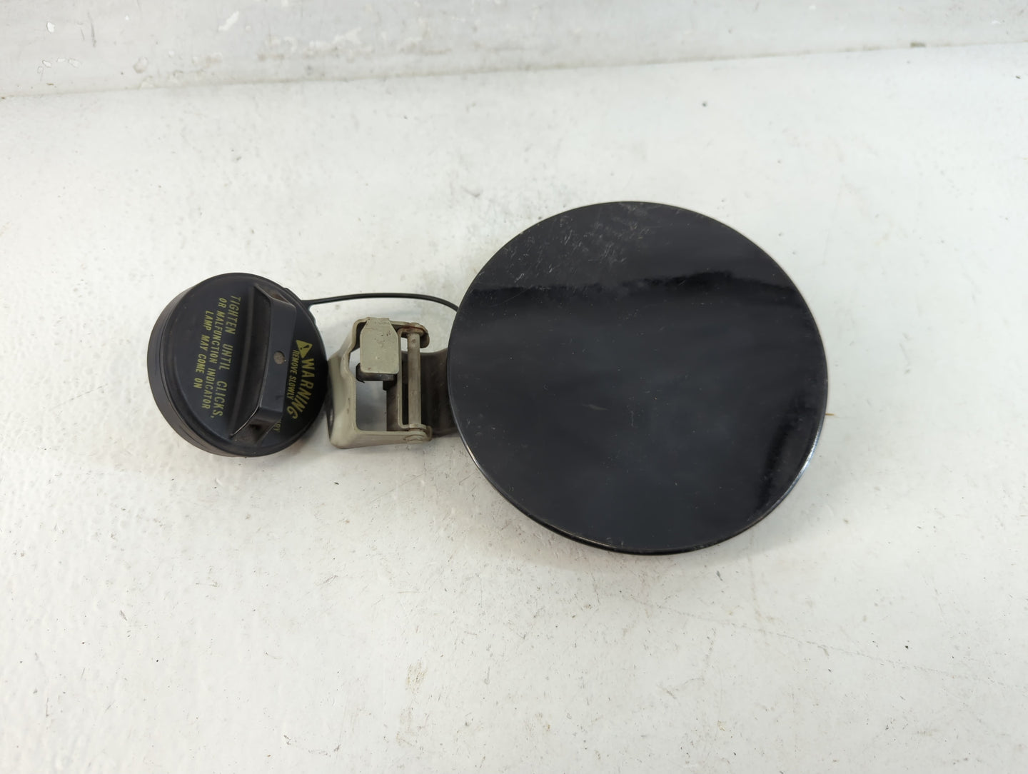 2008 Suzuki Sx4 Fuel Tank Door Lid Gas Tank Black - Oemusedautoparts1.com