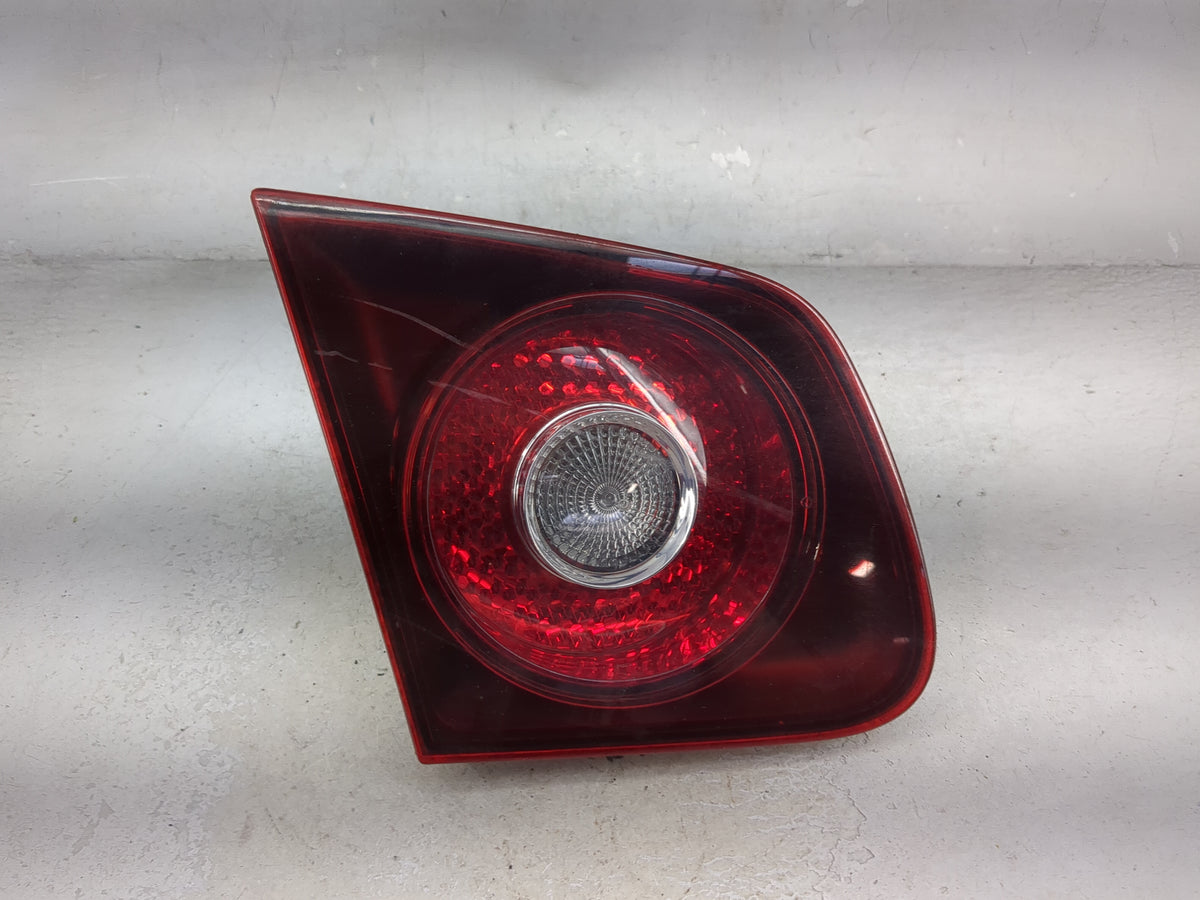2005-2007 Volkswagen Jetta Driver Left Side Deck Lid Mounted Tail Light 1512062 - Oemusedautoparts1.com