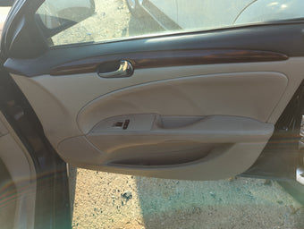 compare product 2009 Buick Lucerne Front Right Passenger Interior Door Panel Trim