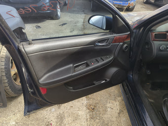 compare product 2009 Chevrolet Impala Front Left Driver Interior Door Panel Trim 1225953
